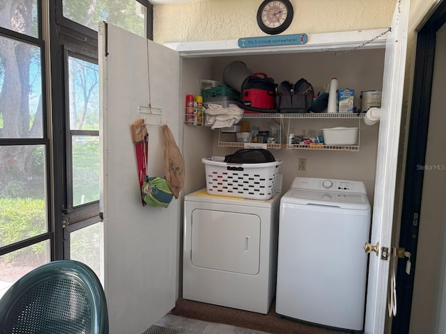 303 Meadow Ln, Oldsmar, FL 34677 - laundry room featuring separate washer and dryer, plenty of natural light, and tile patterned flooring