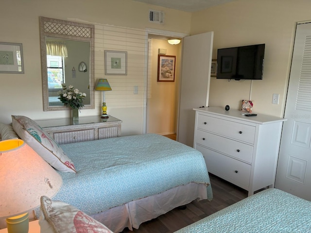 303 Meadow Ln, Oldsmar, FL 34677 - bedroom with wood finished floors