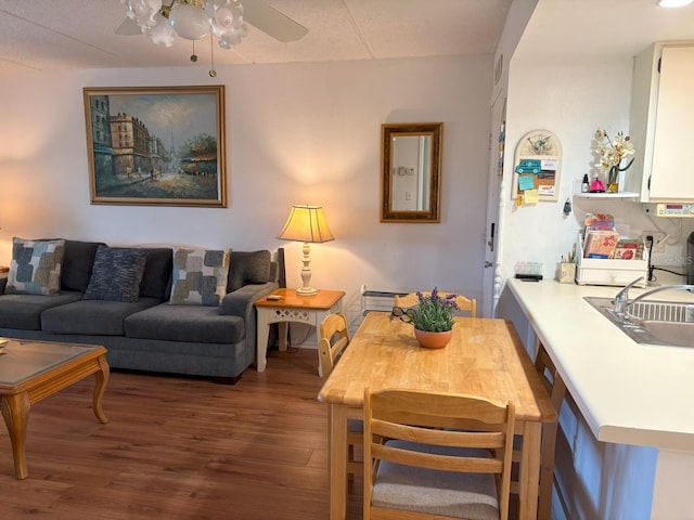 303 Meadow Ln, Oldsmar, FL 34677 - dining room with wood finished floors and a ceiling fan