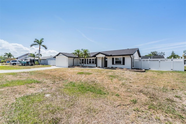 7607 22nd Ave W, Bradenton, FL 34209 - single story home featuring concrete driveway, an attached garage, and stucco siding