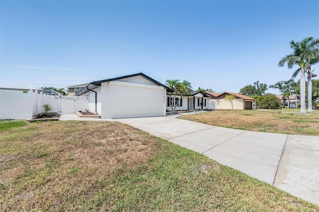7607 22nd Ave W, Bradenton, FL 34209 - ranch-style house featuring a garage, concrete driveway, and stucco siding