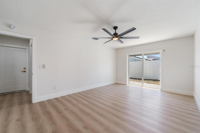 7607 22nd Ave W, Bradenton, FL 34209 - unfurnished room featuring light wood-type flooring, baseboards, a ceiling fan, and a smoke detector