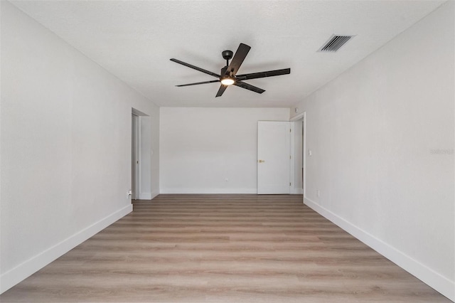 7607 22nd Ave W, Bradenton, FL 34209 - empty room featuring a ceiling fan, light wood-style flooring, and baseboards