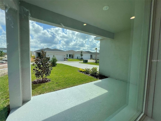 28547 Hillcrest Valley Blvd, Wesley Chapel, FL 33543 - view of grassy yard with driveway