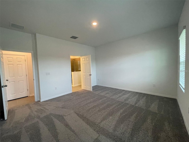 28547 Hillcrest Valley Blvd, Wesley Chapel, FL 33543 - unfurnished bedroom with carpet floors, baseboards, and recessed lighting