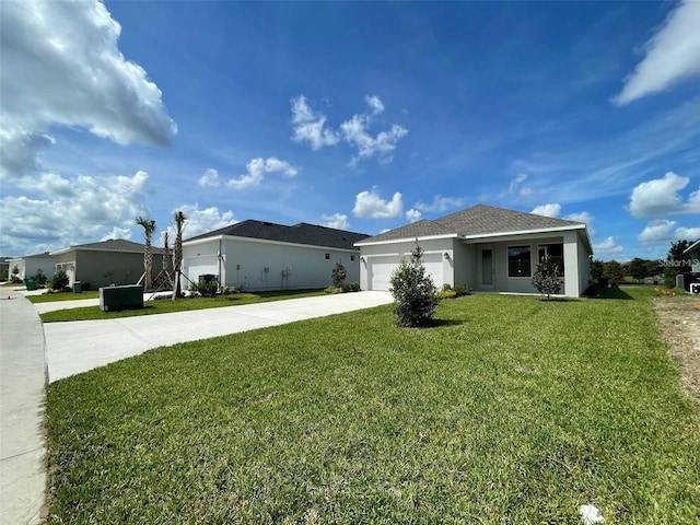 28547 Hillcrest Valley Blvd, Wesley Chapel, FL 33543 - single story home with driveway, a garage, a front yard, and stucco siding