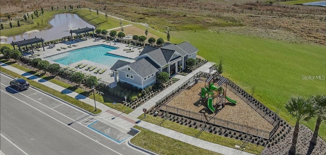 28547 Hillcrest Valley Blvd, Wesley Chapel, FL 33543 - drone / aerial view of a nearby body of water and a pool