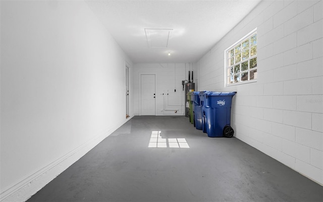2613 E 113th Ave, Tampa, FL 33612 - garage with water heater and concrete block wall