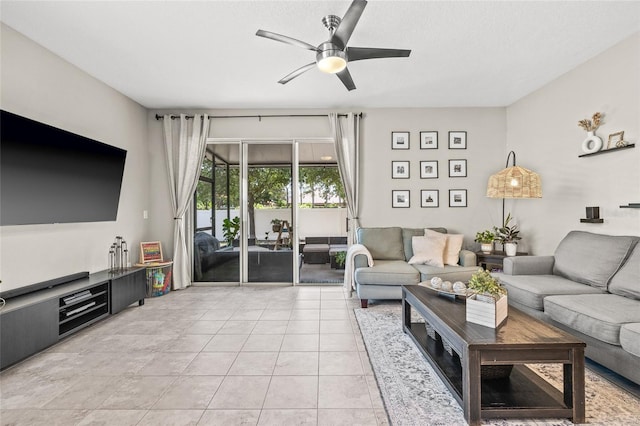 6974 Holly Heath Dr, Riverview, FL 33578 - living area with a ceiling fan and light tile patterned flooring