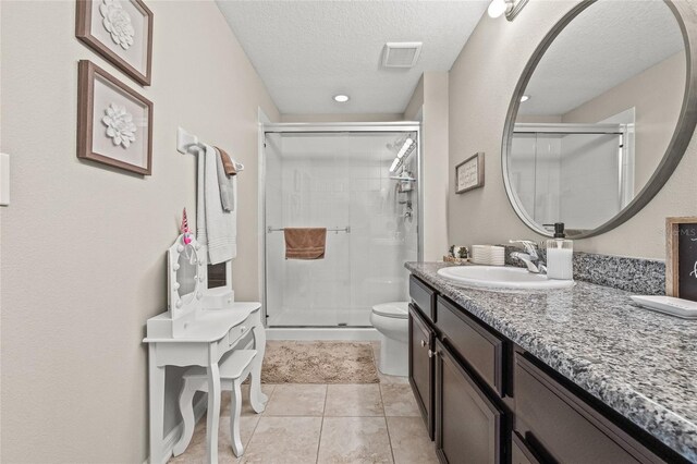 6974 Holly Heath Dr, Riverview, FL 33578 - bathroom featuring a shower stall, toilet, a textured ceiling, vanity, and recessed lighting