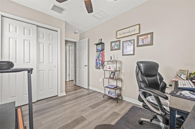 6974 Holly Heath Dr, Riverview, FL 33578 - office space with ceiling fan, wood finished floors, and baseboards