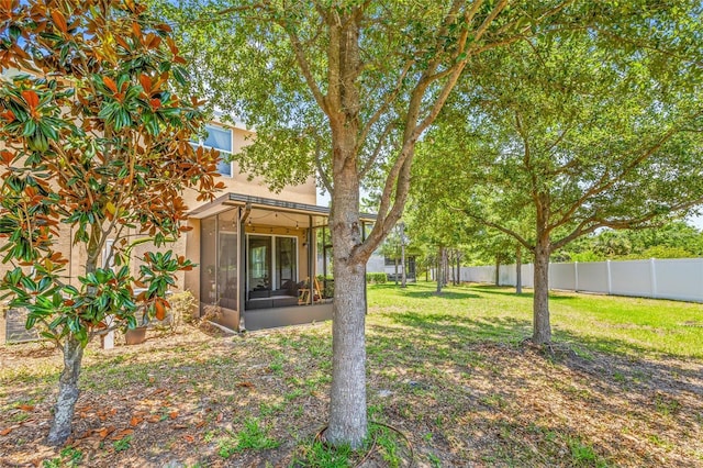 6974 Holly Heath Dr, Riverview, FL 33578 - view of yard featuring a sunroom