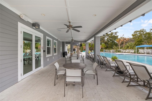 6974 Holly Heath Dr, Riverview, FL 33578 - view of patio featuring french doors, a ceiling fan, and a wooden deck