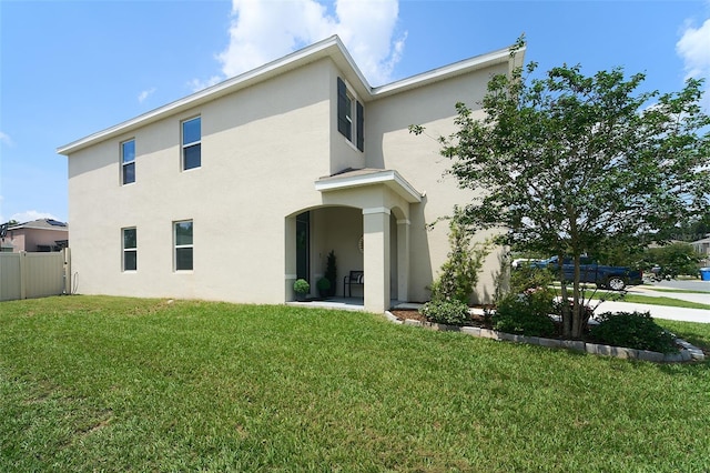 10826 Trailing Vine Dr, Tampa, FL 33610 - back of house with stucco siding