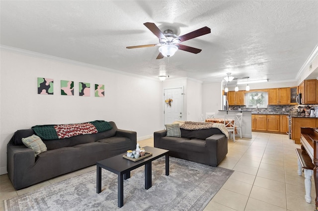 4032 Cortez Dr Unit A, Tampa, FL 33614 - living room with a textured ceiling, ceiling fan, ornamental molding, light tile patterned floors, and baseboards