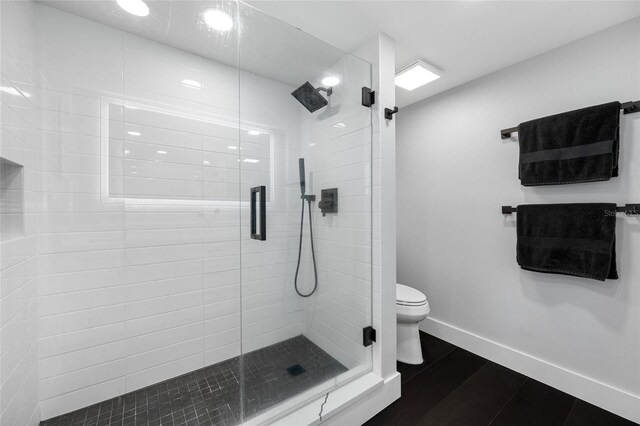 100 Oakmont Ln Unit 802, Belleair, FL 33756 - full bath with toilet, a shower stall, baseboards, and recessed lighting