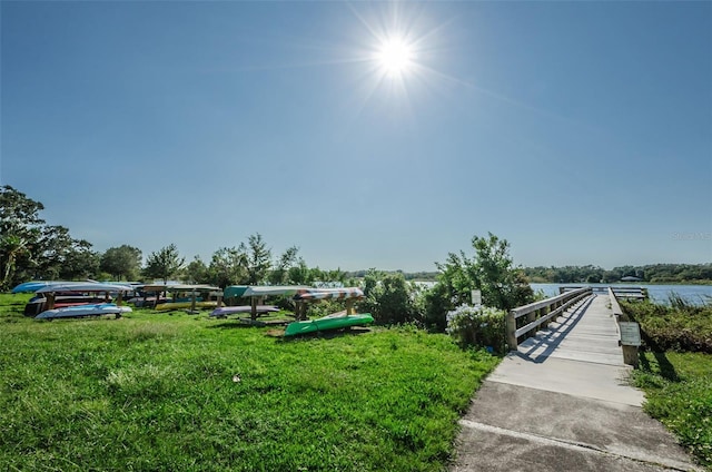 2073 Denmark St Unit 9, Clearwater, FL 33763 - view of property's community with a lawn and a water view