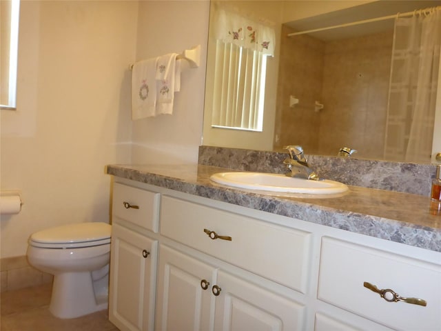 12271 Centralia Rd, Weeki Wachee, FL 34614 - bathroom featuring vanity, toilet, tile patterned flooring, and curtained shower