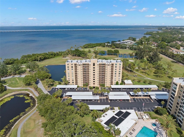 2620 Cove Cay Dr Unit 704, Clearwater, FL 33760 - bird's eye view of apartment complex, a nearby body of water, and a pool area