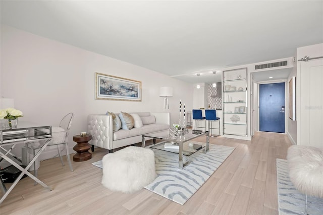 2620 Cove Cay Dr Unit 704, Clearwater, FL 33760 - living area featuring light wood-style flooring