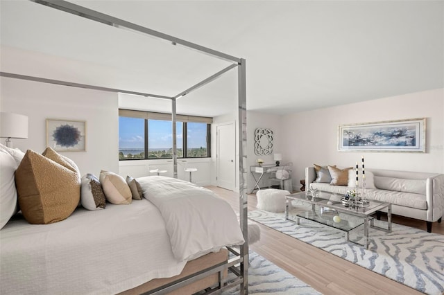 2620 Cove Cay Dr Unit 704, Clearwater, FL 33760 - bedroom featuring wood finished floors