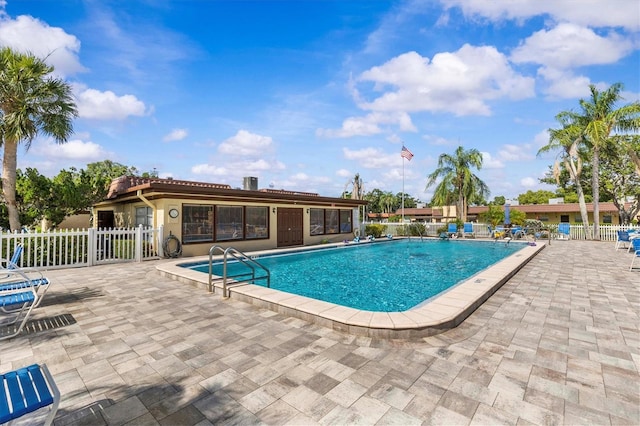 1701 Pinehurst Rd Unit 9G, Dunedin, FL 34698 - community pool with a patio area