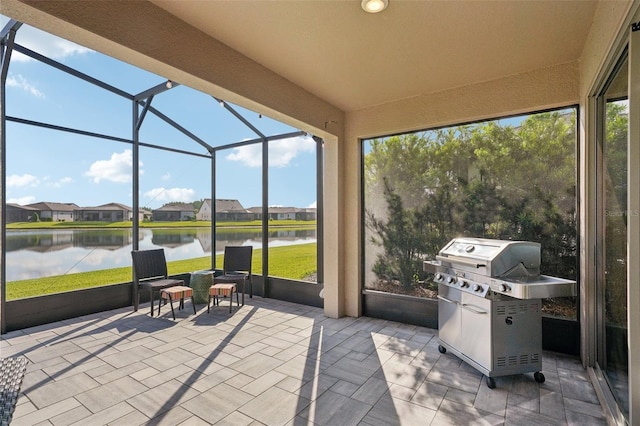 19183 Coastal Shore Ter, Land O Lakes, FL 34638 - sunroom with a water view and a residential view