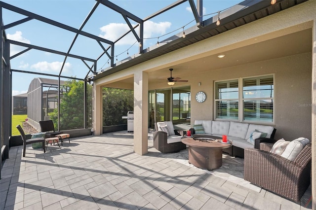 19183 Coastal Shore Ter, Land O Lakes, FL 34638 - view of patio / terrace with an outdoor hangout area, a ceiling fan, glass enclosure, and grilling area