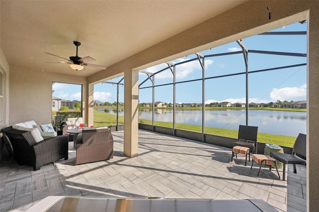 19183 Coastal Shore Ter, Land O Lakes, FL 34638 - view of patio featuring a water view, outdoor lounge area, a ceiling fan, a lanai, and a residential view