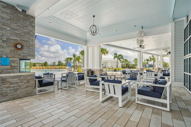 19183 Coastal Shore Ter, Land O Lakes, FL 34638 - view of patio featuring an outdoor hangout area and an outdoor pool