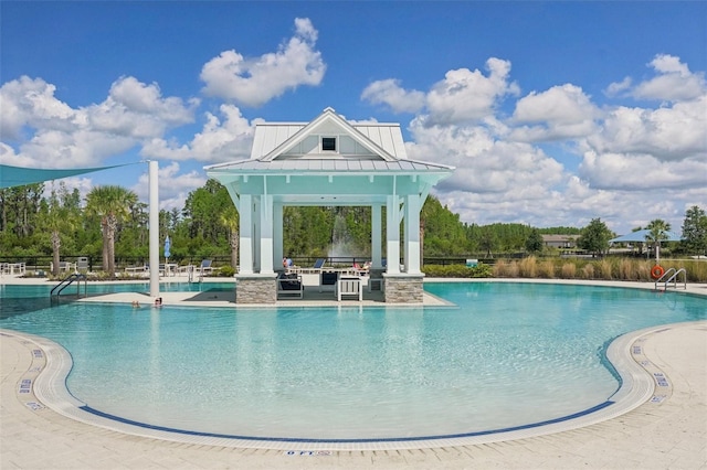 19183 Coastal Shore Ter, Land O Lakes, FL 34638 - community pool with a gazebo and a patio area