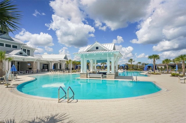 19183 Coastal Shore Ter, Land O Lakes, FL 34638 - community pool with a patio and a gazebo