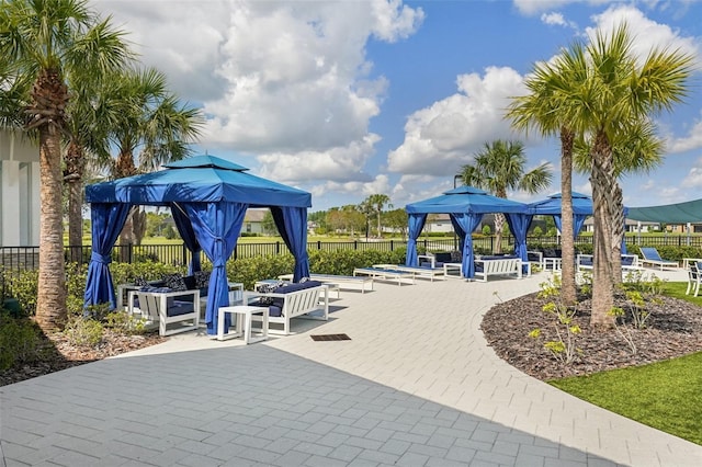 19183 Coastal Shore Ter, Land O Lakes, FL 34638 - view of community with a gazebo, a patio, and outdoor lounge area