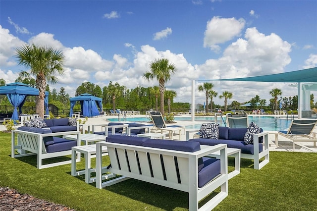 19183 Coastal Shore Ter, Land O Lakes, FL 34638 - view of patio with an outdoor hangout area, a community pool, and a gazebo