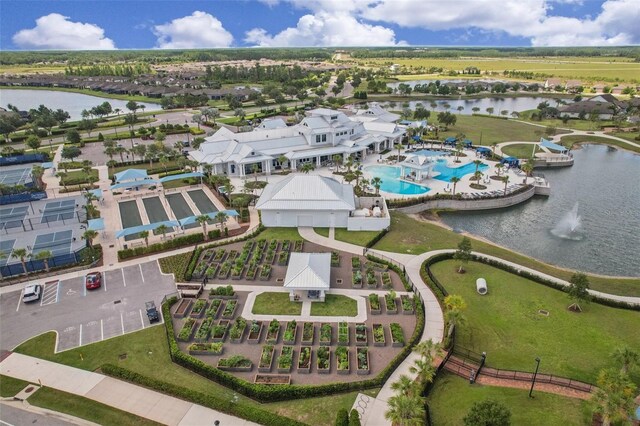 19183 Coastal Shore Ter, Land O Lakes, FL 34638 - aerial view of property and surrounding area featuring a large body of water and a pool area