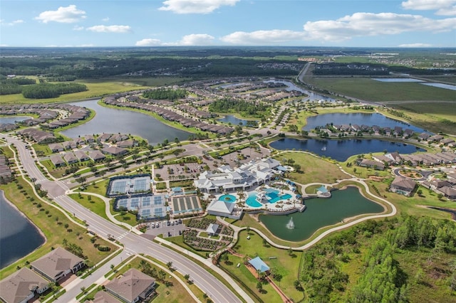 19183 Coastal Shore Ter, Land O Lakes, FL 34638 - aerial view of property and surrounding area with a large body of water and nearby suburban area