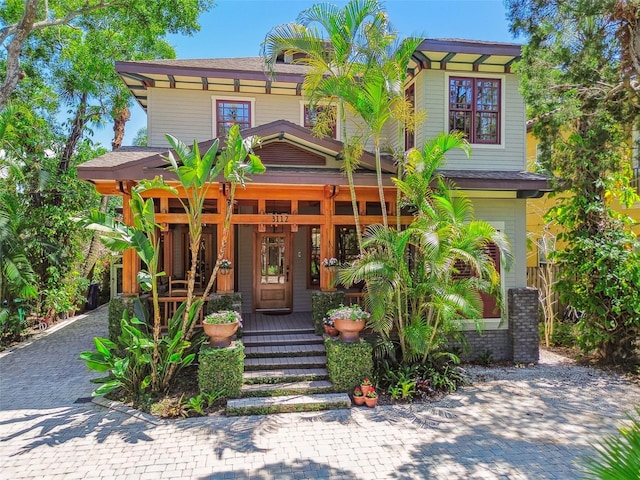 3112 W Wallcraft Ave, Tampa, FL 33611 - view of front of property featuring a porch