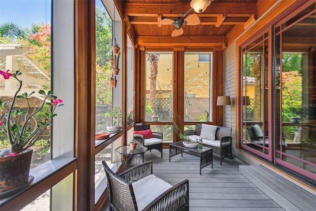 3112 W Wallcraft Ave, Tampa, FL 33611 - sunroom / solarium featuring a ceiling fan, beamed ceiling, and outdoor lounge area