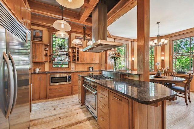 3112 W Wallcraft Ave, Tampa, FL 33611 - kitchen with built in appliances, open shelves, brown cabinets, a chandelier, and light wood finished floors