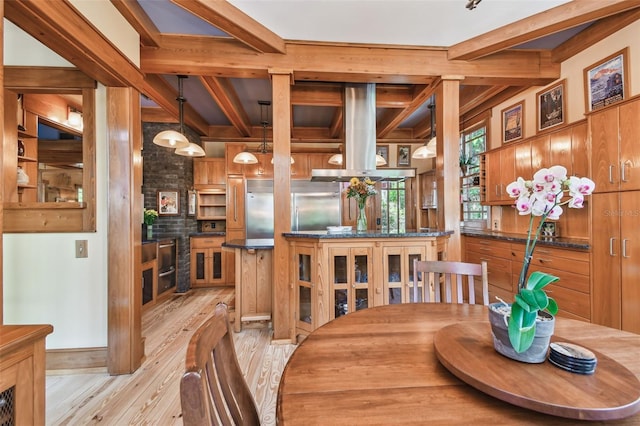 3112 W Wallcraft Ave, Tampa, FL 33611 - dining space featuring light wood finished floors, beamed ceiling, and coffered ceiling