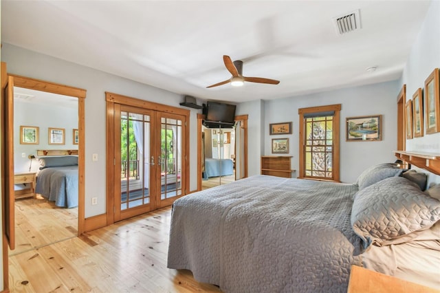 3112 W Wallcraft Ave, Tampa, FL 33611 - bedroom featuring french doors, access to outside, multiple windows, and light wood finished floors