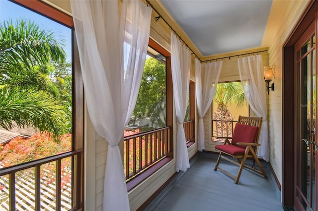 3112 W Wallcraft Ave, Tampa, FL 33611 - sunroom featuring wood finished floors