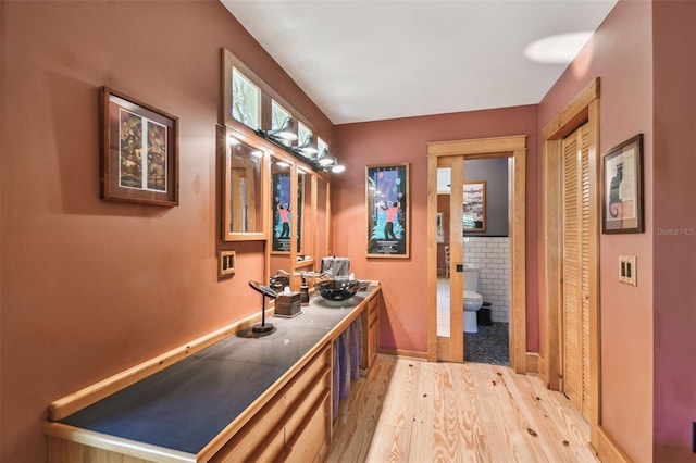 3112 W Wallcraft Ave, Tampa, FL 33611 - bar featuring light wood finished floors and baseboards