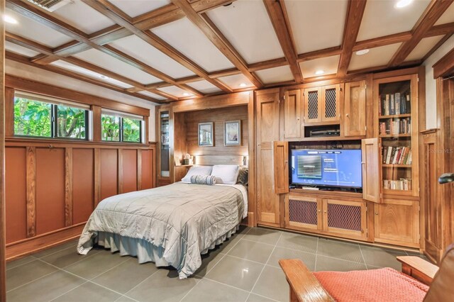 3112 W Wallcraft Ave, Tampa, FL 33611 - bedroom featuring coffered ceiling, tile patterned flooring, wooden walls, and recessed lighting