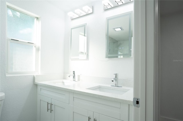 5510 12th St, Zephyrhills, FL 33542 - full bathroom with double vanity and toilet