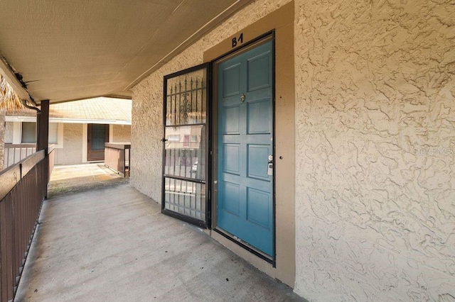 6324 Newtown Cir Unit 24B1, Tampa, FL 33615 - entrance to property featuring stucco siding