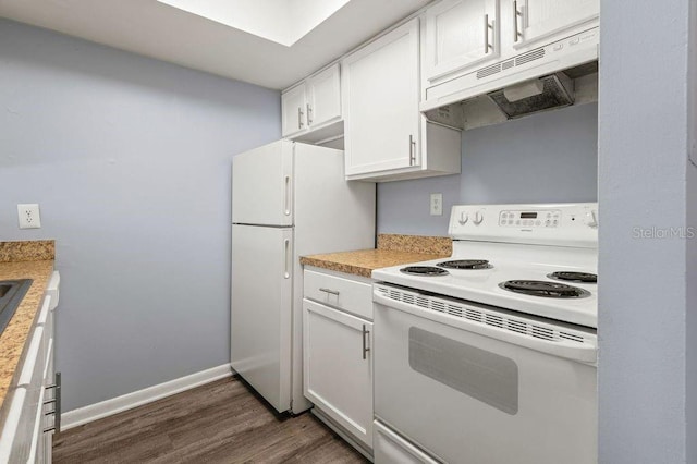 6324 Newtown Cir Unit 24B1, Tampa, FL 33615 - kitchen with white appliances, under cabinet range hood, dark wood finished floors, white cabinets, and light countertops