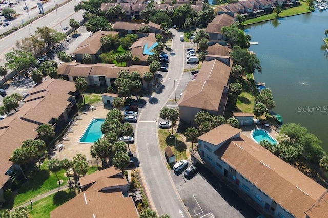 6324 Newtown Cir Unit 24B1, Tampa, FL 33615 - aerial view of property's location with a pool, nearby suburban area, and a nearby body of water