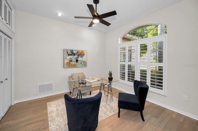 4962 Turtle Creek Trl, Oldsmar, FL 34677 - home office featuring wood finished floors, baseboards, and ceiling fan
