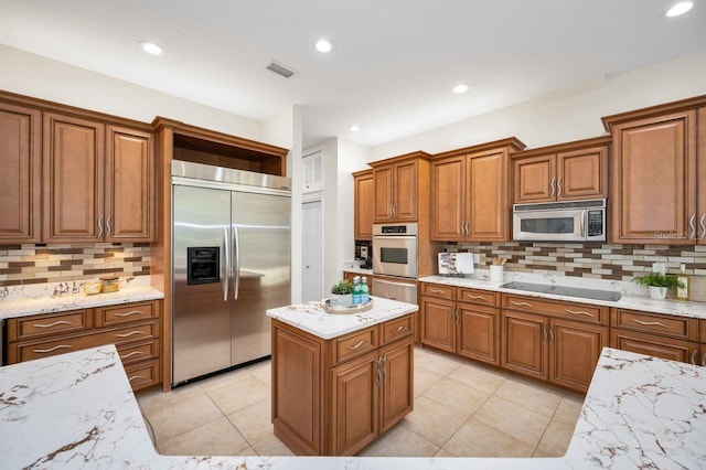 4962 Turtle Creek Trl, Oldsmar, FL 34677 - kitchen featuring stainless steel appliances, brown cabinets, open shelves, tasteful backsplash, and a warming drawer